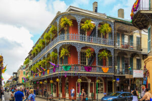 New Orleans USA Feb 2 2016:Visitors and locals are all over in the French Quarter's streets of New Orleans. People are celebrating and partying while enjoying the street music. This is an ongoing life style . There are a lot of talented artists in the city.